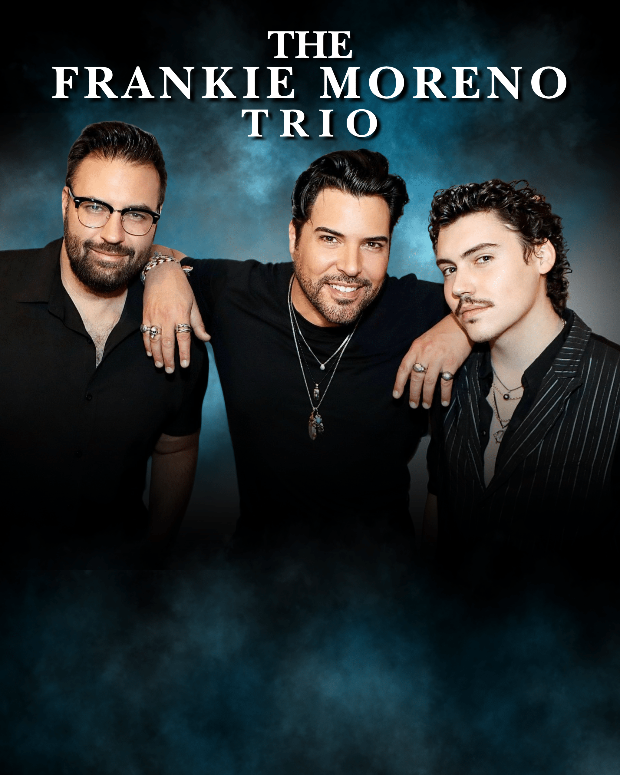 Three men, "THE FRANKIE MORENO TRIO," pose smiling with arms around each other on a dark blue background.